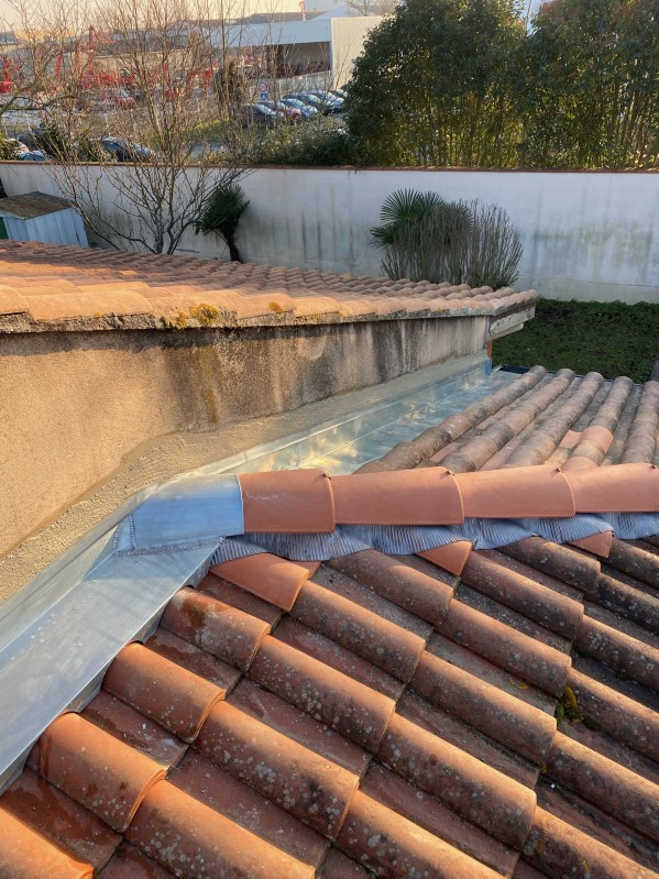 instalation de bavette en zinc naturel suite à infiltration à Tournefeuille 